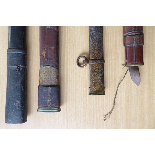 450 - An 1897 Pattern brown-leather sword scabbard together with three other longer antique sword scabbard... 