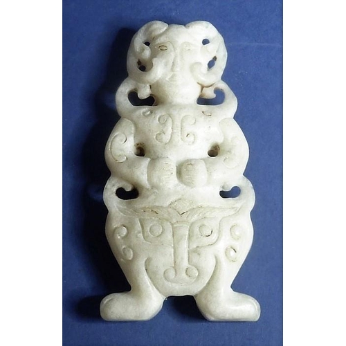 465 - An Asian hardstone Naga pendant, belt insert and two Sung, bead pendants (5)