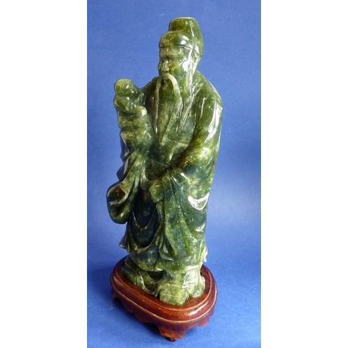 472 - A Feng Tian green jade god Fuxing (29cm high)