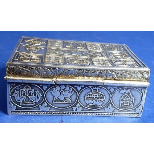 475 - An antique Asian silver spice box, an Asian silver guardian lion, a mother of pearl brooch and a dra... 