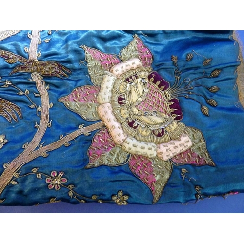 477 - 19th century India, a Zardozi noble silk embroidery depicting two peacocks with snakes (109cm x 52cm... 