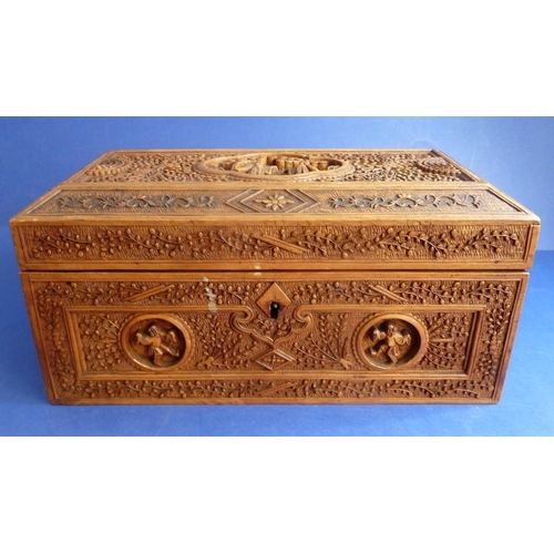 483 - An antique Asian carved hardwood box decorated with dancing figures and fine floral scrolls (12.5cm ... 