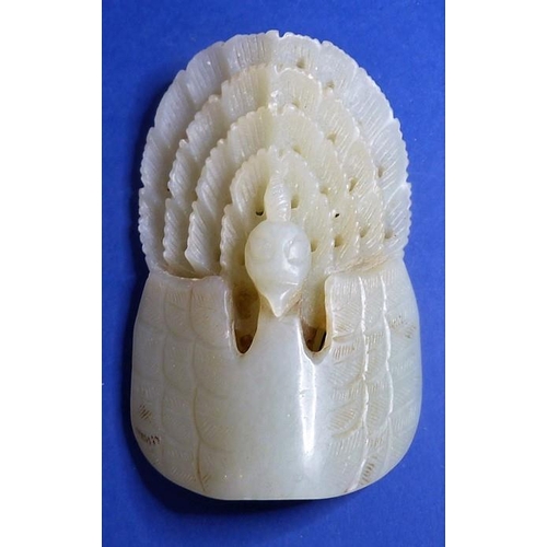 487 - A hand-carved Asian pale celadon jade peacock/phoenix hair or headdress ornament (8.5cm x 5.5cm)