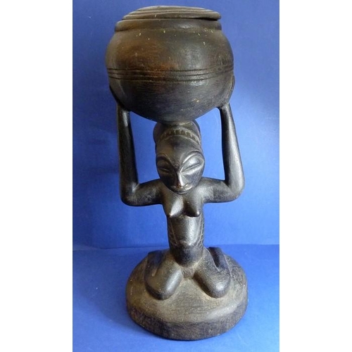 497 - A large African carved wood Luba tribal art female fertility bowl carrier (53cm high)