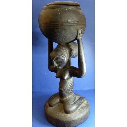 497 - A large African carved wood Luba tribal art female fertility bowl carrier (53cm high)