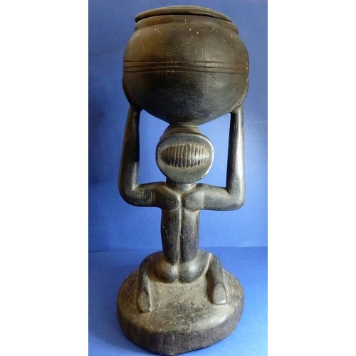 497 - A large African carved wood Luba tribal art female fertility bowl carrier (53cm high)