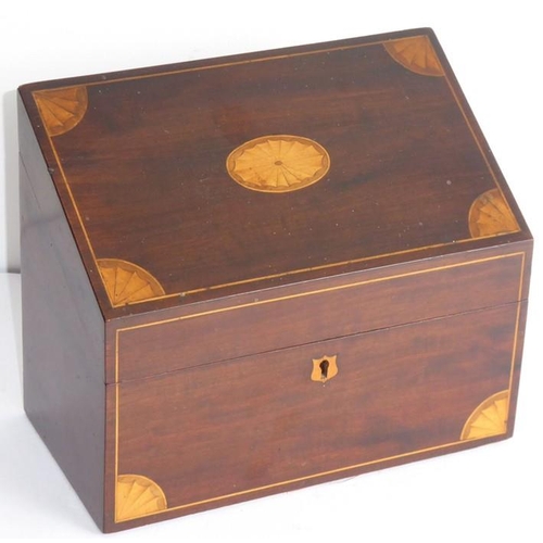 501 - A late 19th/early 20th century mahogany and a boxwood-strung stationery cabinet; the angular fall he... 