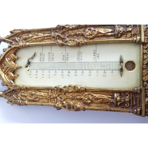 507 - A 19th century cast gilt-metal thermometer stand in high Gothic style; with ivory register plate but... 