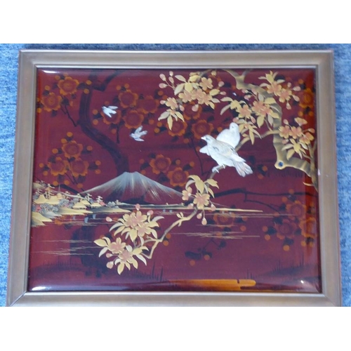 514 - A fine early 20th century framed Japanese red-lacquer and gilt panel depicting Mount Fuji with prunu... 