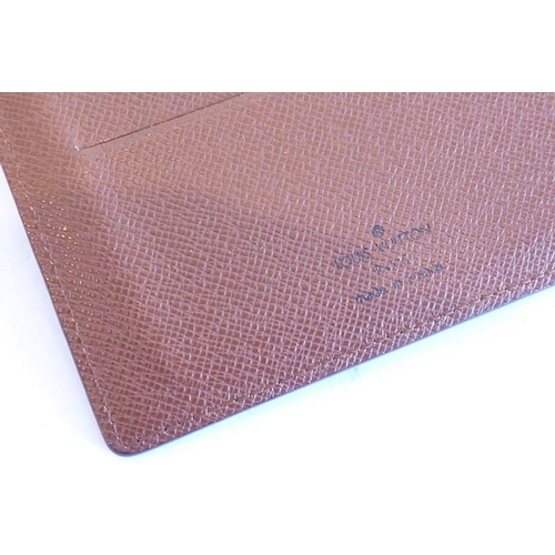 520 - Louis Vuitton, a boxed collection; a leather card wallet and two further similar card wallets (3)