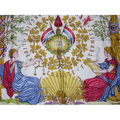 530 - A Hermés (France) silk scarf decorated with the 1789 revolution, signed lower right (89cm square)