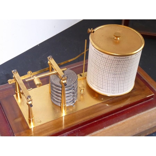 535 - An early 20th century mahogany-cased barograph; with interior gilded-metal ware and the circular gra... 