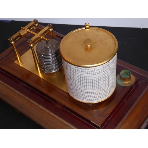 535 - An early 20th century mahogany-cased barograph; with interior gilded-metal ware and the circular gra... 