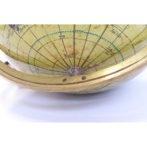 556 - An early 19th century Newton's Pocket Terrestrial Globe (marked 'Newton's New & Improved Terrestrial... 