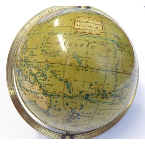 556 - An early 19th century Newton's Pocket Terrestrial Globe (marked 'Newton's New & Improved Terrestrial... 
