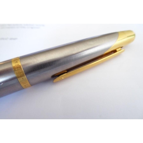 572 - A modern cased Alfred Dunhill AD 2000 biro pen; brushed-steel cigar-shaped barrel with gold-plated m... 