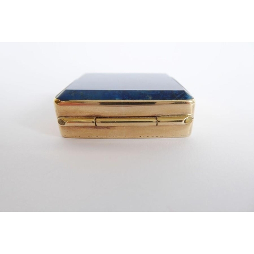 578 - A small gilt-metal snuff box; set with a rectangular lapis lazuli top (3.5cm wide)