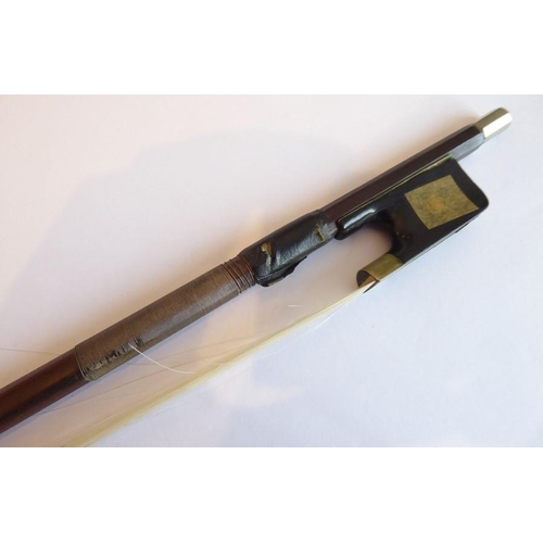 584 - A cello bow (small amount of damage and reparation to end of bow) (70cm)