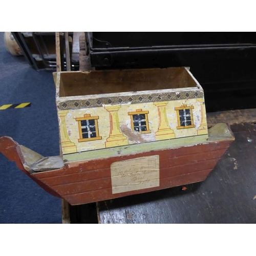 586 - A late 19th/early 20th century wooden Noah's Ark; in play-worn condition and with a variety of the u... 