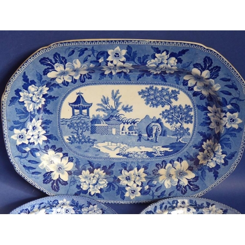 60 - An early 19th century blue-and-white platter unusually depicting an elephant and attendant before Or... 