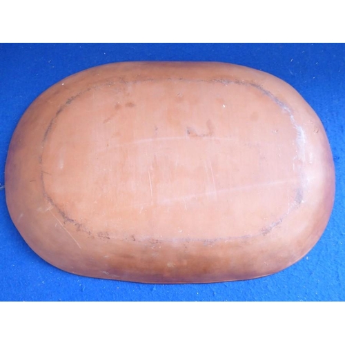 61 - A Studio-ware style terracotta slipware glazed dish of oval section; impressed monogram to underside... 