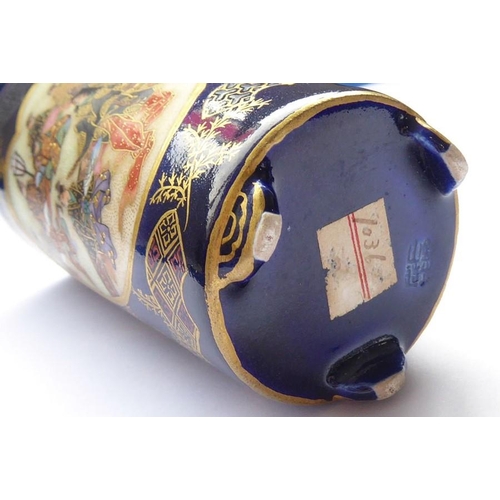 68 - A good and small cylindrical Japanese porcelain spill vase, circa 1900; decorated with two opposing ... 