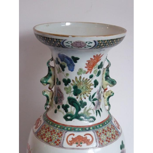 74 - A large mid 19th century Chinese porcelain vase; the flaring rim above a waisted neck decorated in e... 