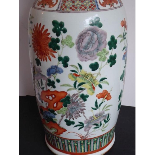 74 - A large mid 19th century Chinese porcelain vase; the flaring rim above a waisted neck decorated in e... 