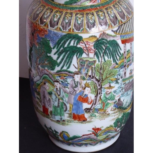 75 - An unusual Chinese enamelled vase (as a lamp); unusually decorated with a highly enamelled scene of ... 