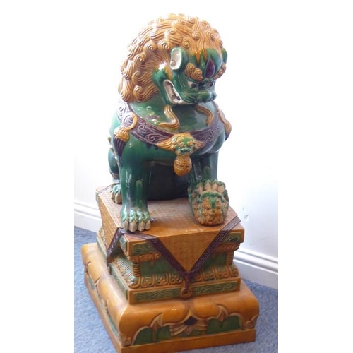 81 - A large and very imposing pair of ceramic karashishi (Buddhistic temple lions), probably first half ... 