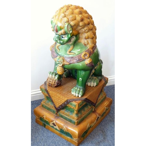 81 - A large and very imposing pair of ceramic karashishi (Buddhistic temple lions), probably first half ... 