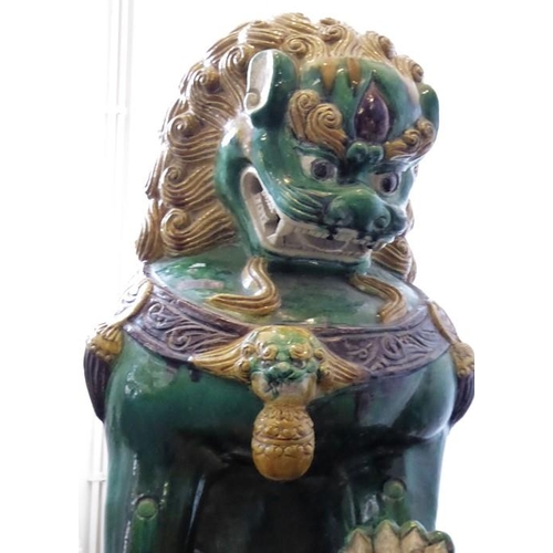 81 - A large and very imposing pair of ceramic karashishi (Buddhistic temple lions), probably first half ... 