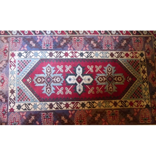 810 - A Turkish Melas rug (approx. 184cm x 113cm)