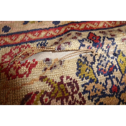 818 - A 19th century Turkish silk prayer rug having unusual yellow ground centre (184cm x 124cm)