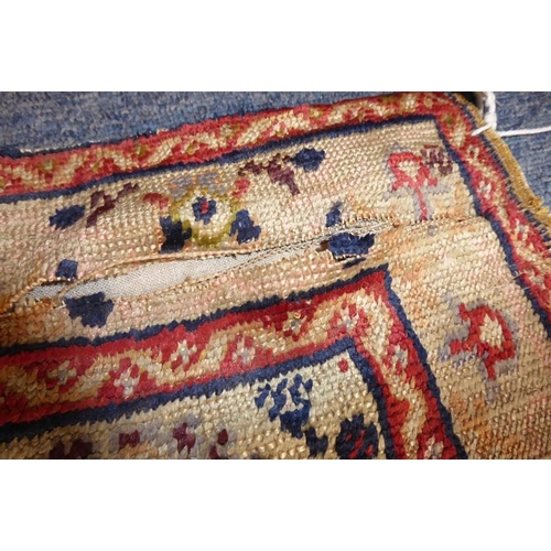 818 - A 19th century Turkish silk prayer rug having unusual yellow ground centre (184cm x 124cm)