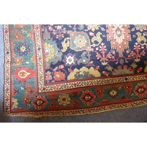 826 - A good mid-19th century north-west Persia corridor carpet; signed and dated 125?, (some wear and red... 