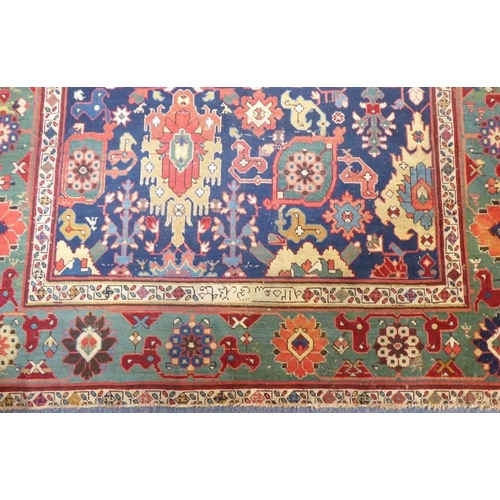 826 - A good mid-19th century north-west Persia corridor carpet; signed and dated 125?, (some wear and red... 