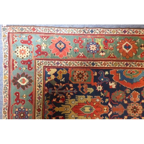 826 - A good mid-19th century north-west Persia corridor carpet; signed and dated 125?, (some wear and red... 