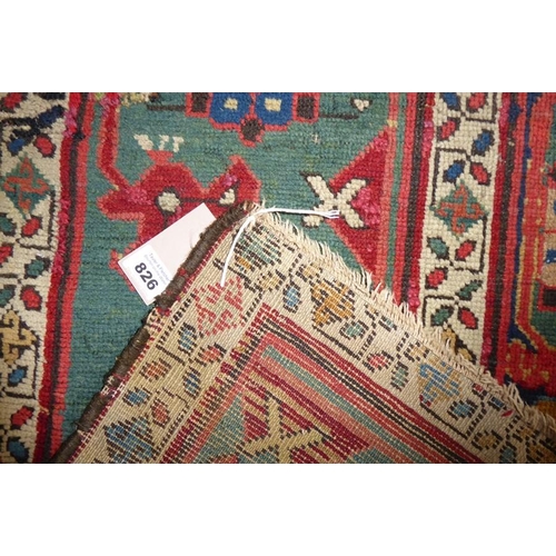 826 - A good mid-19th century north-west Persia corridor carpet; signed and dated 125?, (some wear and red... 