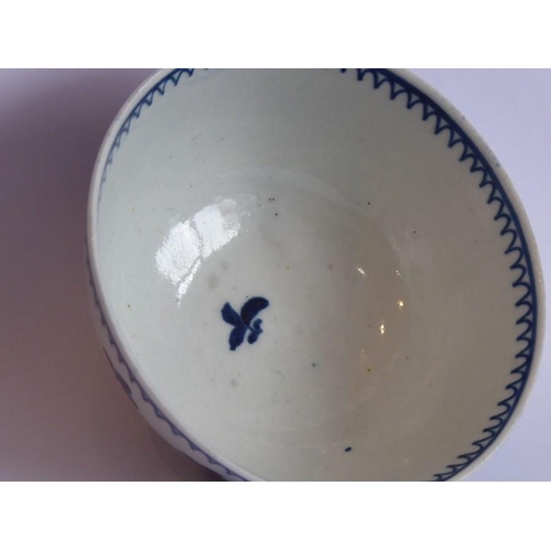 84 - An 18th century Chinese porcelain tea bowl decorated to the exterior with flowerheads and sprigs (8.... 