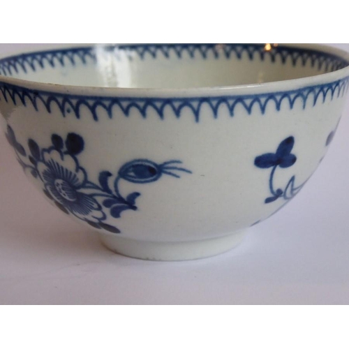 84 - An 18th century Chinese porcelain tea bowl decorated to the exterior with flowerheads and sprigs (8.... 