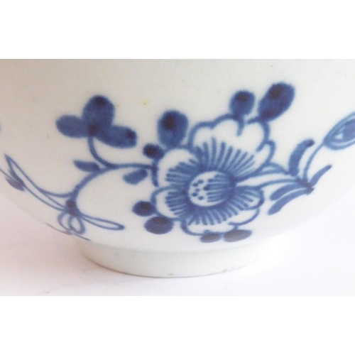 84 - An 18th century Chinese porcelain tea bowl decorated to the exterior with flowerheads and sprigs (8.... 