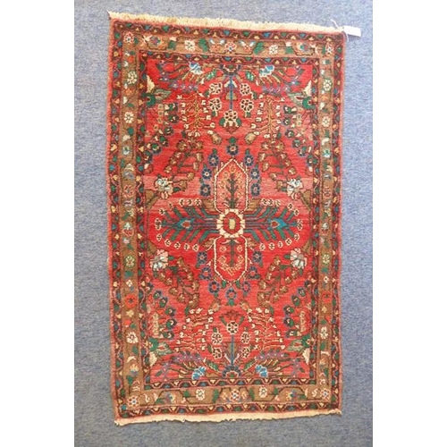 843 - A hand-knotted 20th century Lilihan rug; central stylised crucifix flower head against a predominate... 