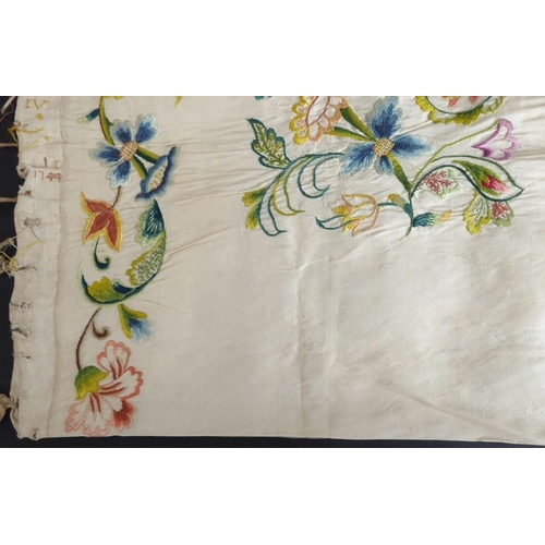 857 - An unfinished silk embroidery with one edge embroidered with '1744'; ivory-coloured silk with a Flor... 