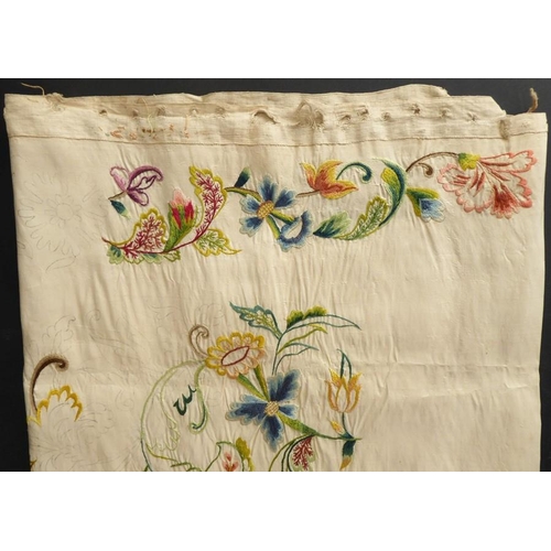 857 - An unfinished silk embroidery with one edge embroidered with '1744'; ivory-coloured silk with a Flor... 