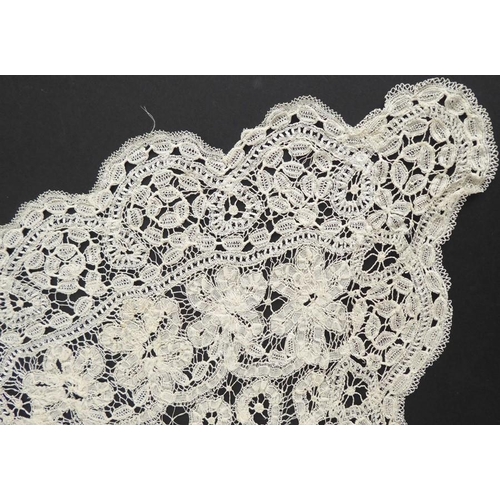 861 - A circa 1890s Brussels lace shawl collar; semi-circular shape with floral motifs and scalloped edge