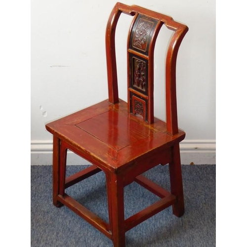 867 - A rare 19th century Chinese red-lacquered hardwood miniature/child's chair; the angular yoke-shaped ... 