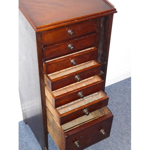 882 - A 19th century mahogany printer's side cabinet; angular galleried top over drawers with compartmenta... 