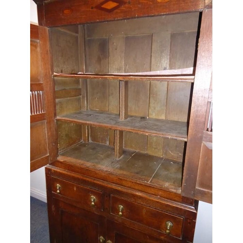 892 - A good 18th century North Country-style oak food cupboard of slim proportions; outset cornice above ... 