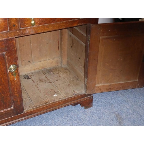 892 - A good 18th century North Country-style oak food cupboard of slim proportions; outset cornice above ... 